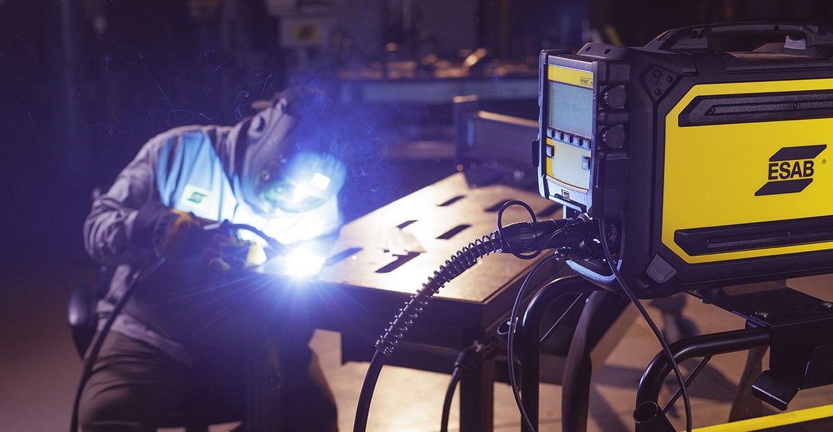 Welder MIG welding with ESAB machine