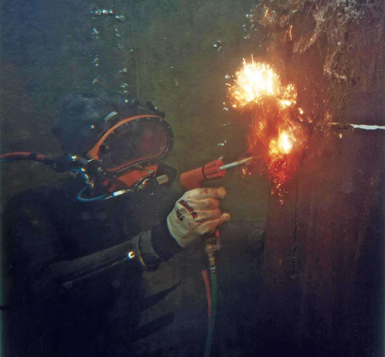 Diver using an Arcair underwater cutting and welding torch