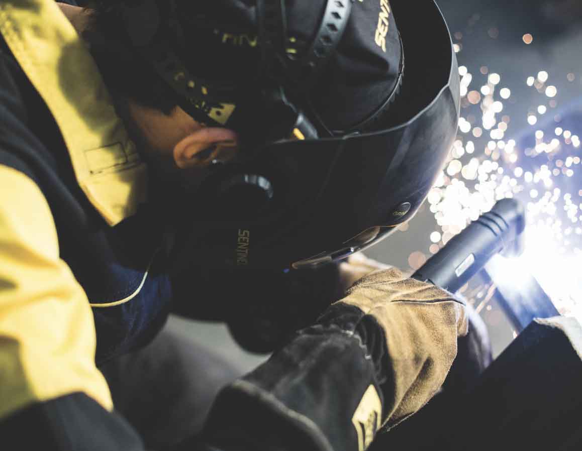 Welder in PPE using a Thermal Dynamics 1Torch for welding