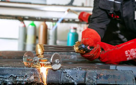 Oxyfuel torch cutting mild steel plate