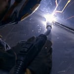 Push-pull MIG welding gun in action welding aluminum with bright arc.