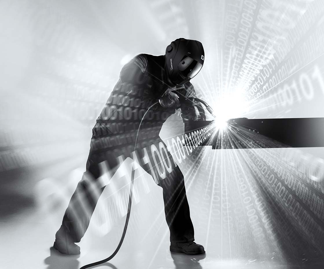 Futuristic welder creating glowing binary code and light beams